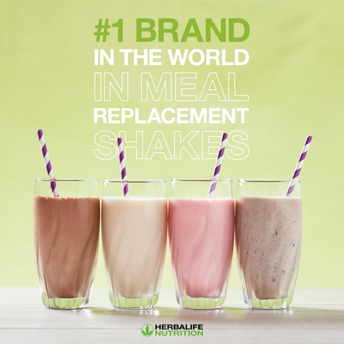 Four meal replacement shakes in glasses with purple straws, promoting Herbalife as top brand.